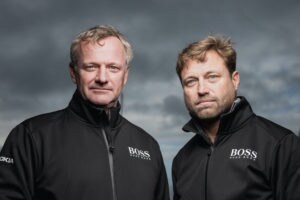 LE HAVRE, FRANCE - OCTOBER 24: Imoca Hugo Boss skippers Alex Thomson and Neal McDonald are posing during pre-start of the Transat Jacques Vabre 2019, duo sailing race from Le Havre, France, to Salvador de Bahia, Brazil, on October 24, 2019 in Le Havre, France.