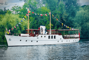 Dunkirk little ship on the water with bunting