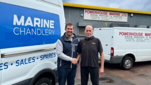 Geoff Moore, Marine Chandlery stands with Mike Newbold, Powerhouse Marine