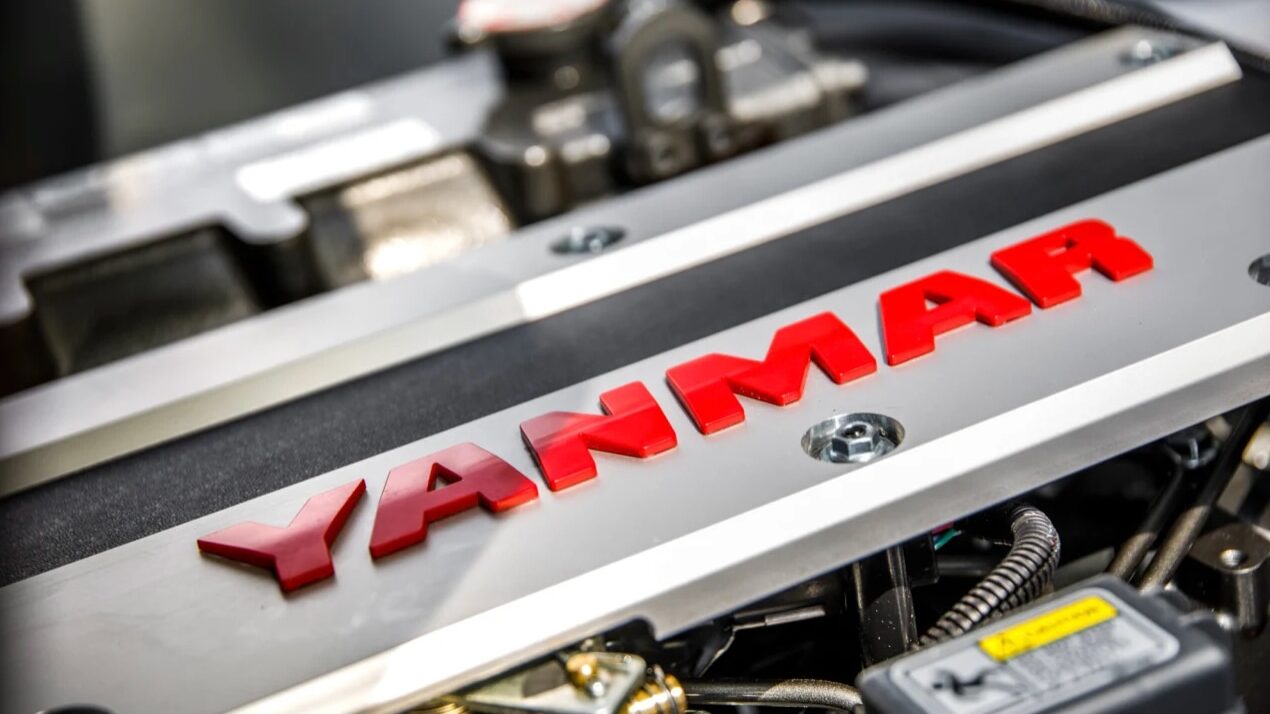 Yanmar logo in red on an engine