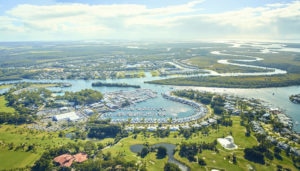 Sanctuary Cove Boat Show seen from the air - marina with pontoons