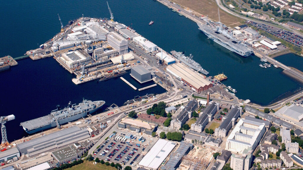 An aerial photograph of Plymouth Naval base with several ships along side, which was taken as part of a Photex, it was taken from 2,000 feet. The Photex was conducted for 849 NAS based at RNAS Culdrose, by a Lynx MK3 from 815 NAS based at RNAS Yeovilton, testing a new radar system that will detect buildings and ships within the dock area.