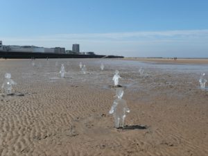 Ice sculptures, rescues and chaos on bank holiday beaches