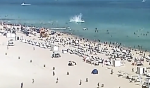 Shocking moment helicopter crashes into the water in Miami