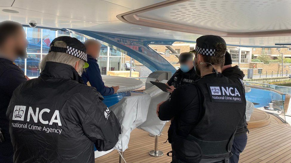 Officers from the National Crime Agency boarded Phi yesterday. Photo courtesy of the National Crime Agency