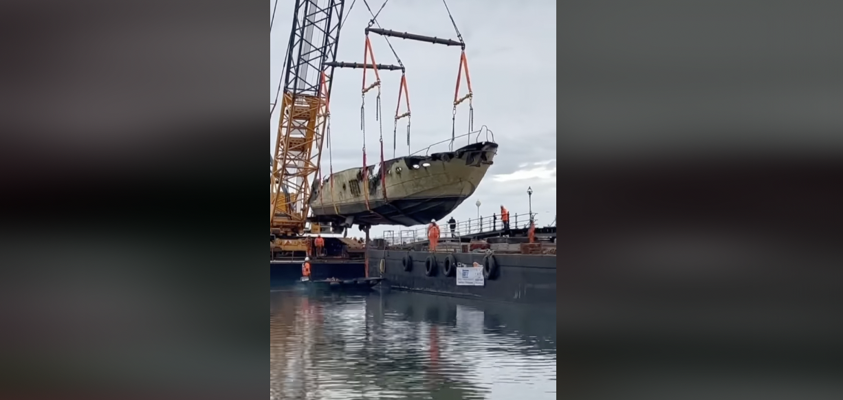 Firegutted motor yacht 'Rendezvous' salvaged from Torquay harbour