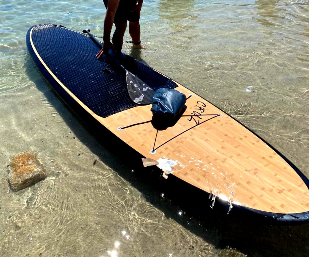 Paddleboard with shark bite marks