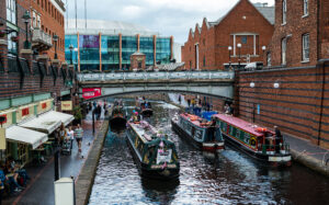 three canal boats taking part in a boating parade in Birmingham