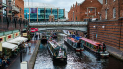 three canal boats taking part in a boating parade in Birmingham