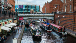 three canal boats taking part in a boating parade in Birmingham