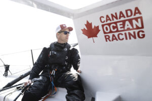 Scott Shawyer onboard his new IMOCA Open60 race yacht ‘ Canada Ocean Racing’. Pictured here training on the teams first run offshore with mentor Alex Thomson