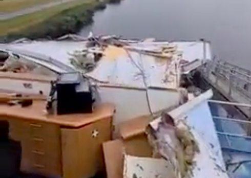 mess created as cargo ship destroyed by bridge