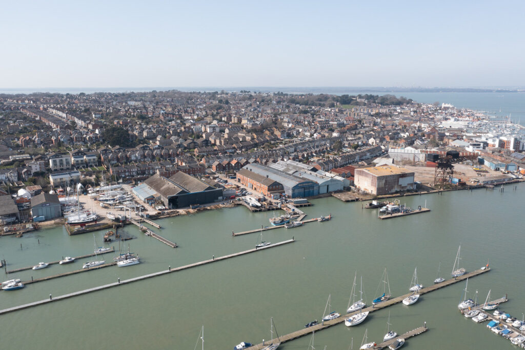 Aerial view of shipyard and marina.