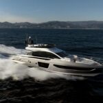 Azimut S7 motorboat powering along the water