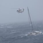 NZ Defence rescue catamaran sailor.