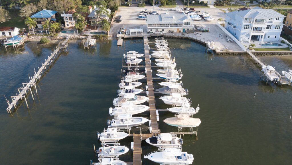 marina with boats on pontoon birds eye view