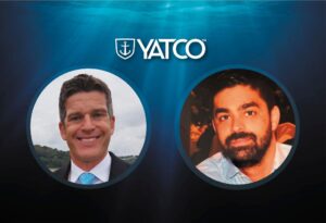 Yatco-Logo und Bilder von zwei dunkelhaarigen Männern