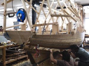 students learn traditional techniques at Boat Building Academy