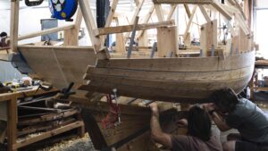 students learn traditional techniques at Boat Building Academy