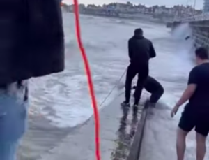 men save teenager with lifebelt from large waves at Bridlington