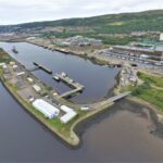 Aerial images of an empty marina and dock