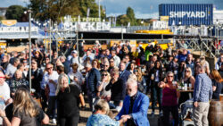 People dancing at a bustling SIBS 2023 F&B area