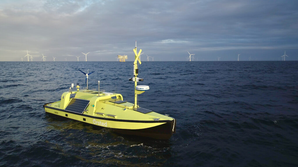 Hugin USV on anchor in front of Anholt wind farm