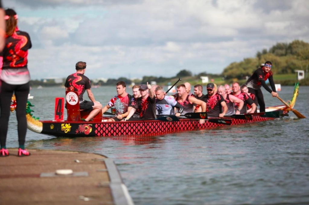 red and black dragon boat missing after Storm Henk. Crewed on river