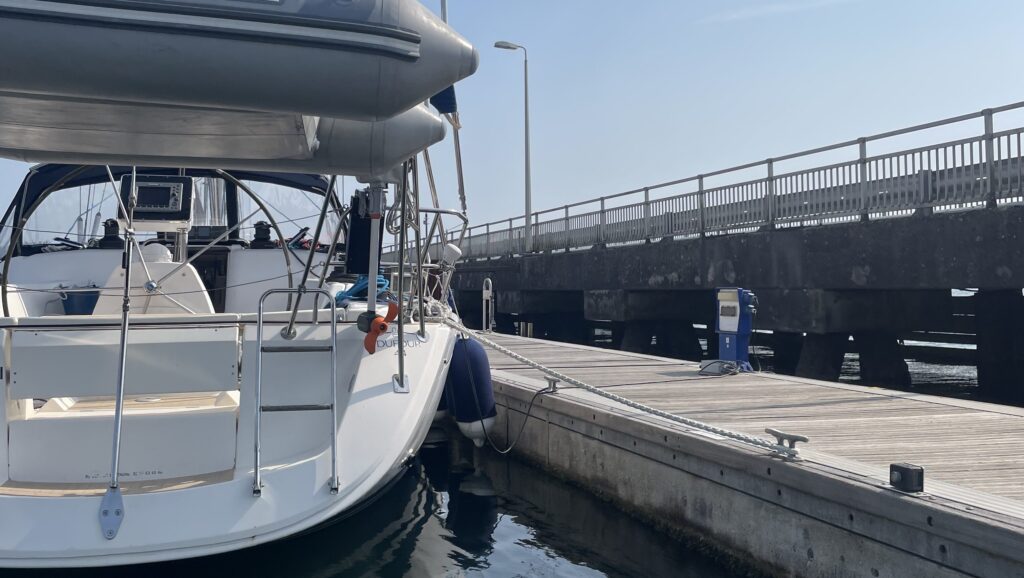smart marinas sensor on dock and cockpit of boat at pontoon