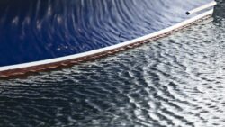 Boat with rippling water reflected