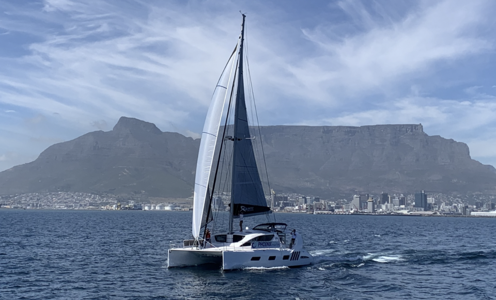 catamaran sailing with Table Mountain backdrop