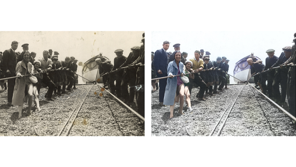 A black and white photograph from 1929 on the left side of the screen next to the same, colourised, image on the right. They show local families pulling on ropes to help recover the lifeboat up the beach after it returned to shore in Brighton.