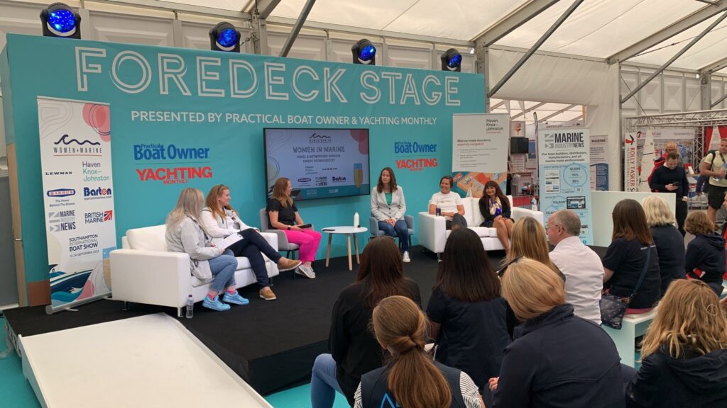 Haven Knox-Johnston staff on stage at boat show