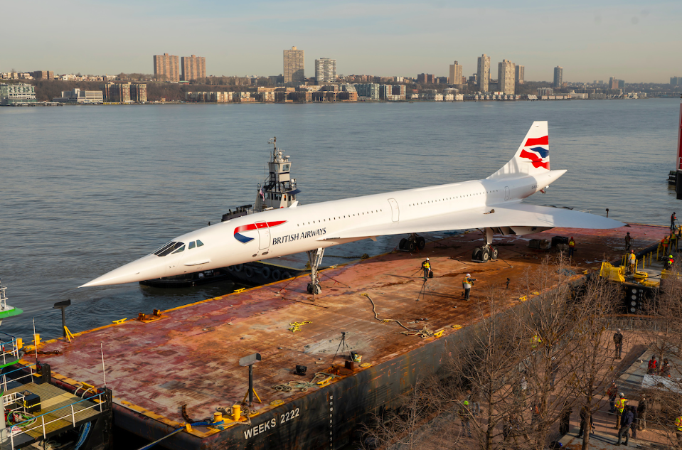 Concorde being loaded onto a barge