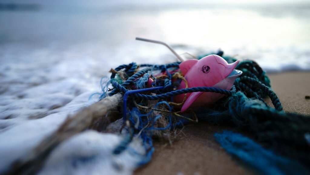 Marine plastic waste on beach.