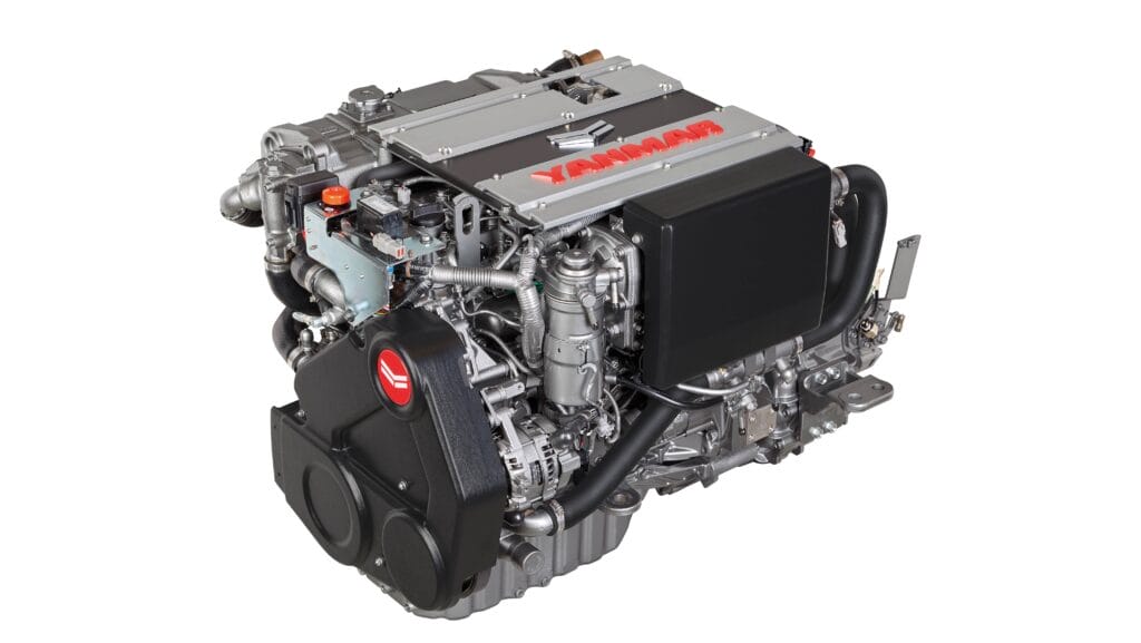 An engine. Silver and black and made by Yanmar.