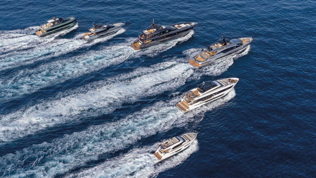 Ferretti Boats surge across the water in a V formation