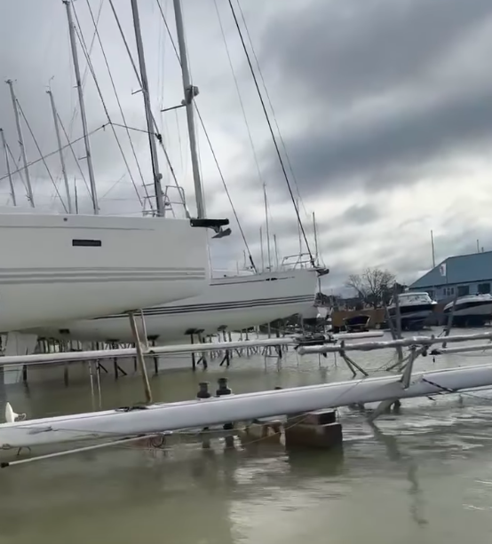 flood water under boats in landside display area at Hamble Point Marina