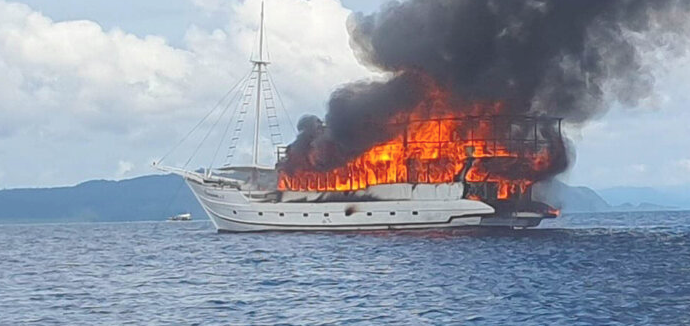 fire rages on a dive boat