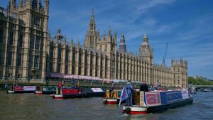 narrowboats join a flotilla at Westminster to prod the government into action on savign waterways