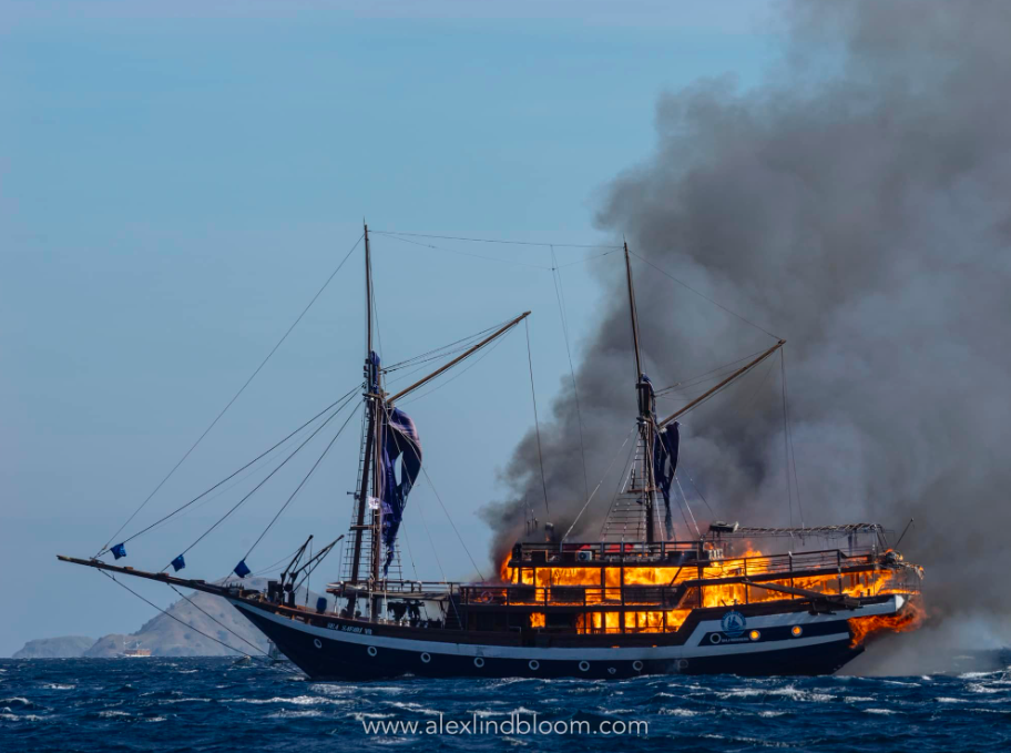 smoke from flames on dive boat