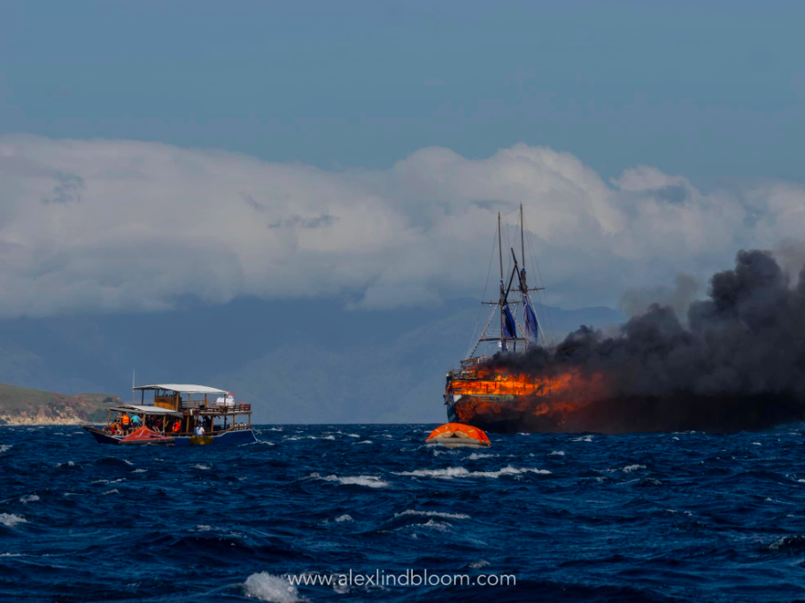rescue boat goes to aid of dive boat on fire