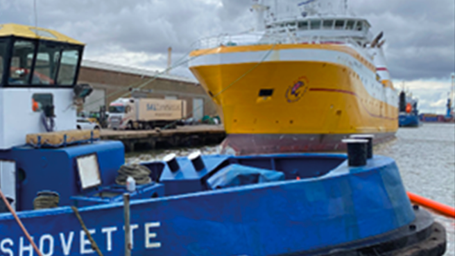 Kirkella and Shovette - fishing trawler and tug pictured next to each other. The two collided, causing pollution