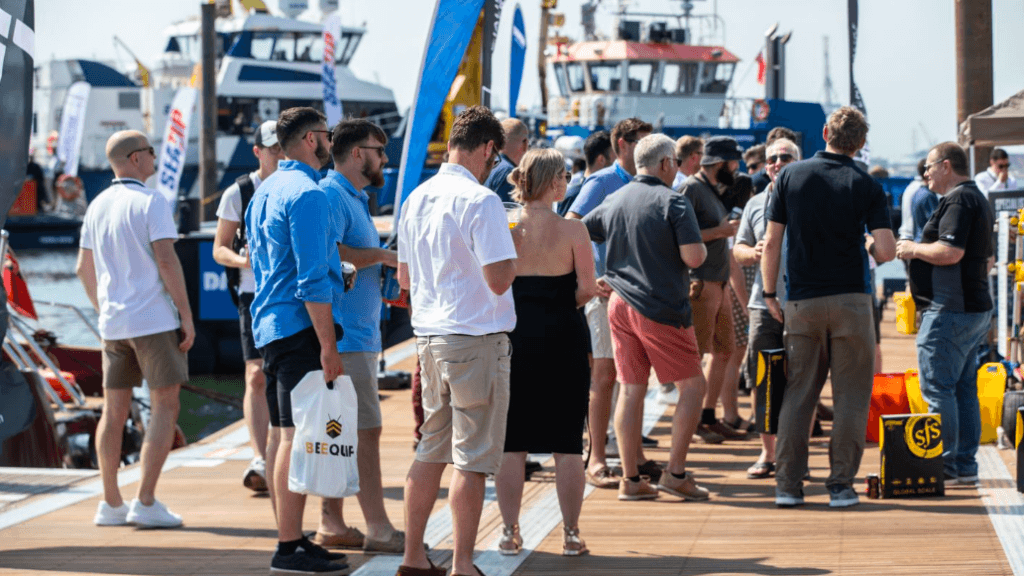 People milling around on a pontoon at Seawork, the commercial boat show in Southampton