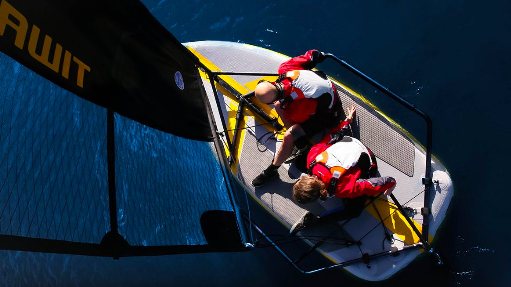 Overhead view of two sailors onboard Tiwal inflatable sailboat / dinghy