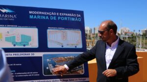 man presenting plan for marina de portimao development
