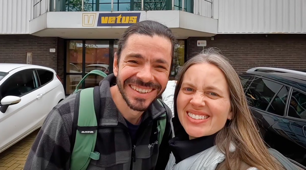 Social media influencers for smile at the camera outside a Vetus building