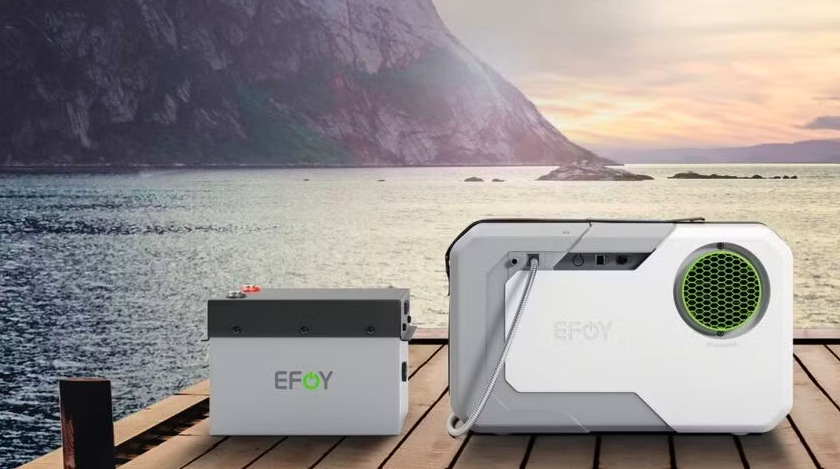 Two boxes on a pontoon which form the EFOY range of fuel cell power generators. EFOY fuel cells use Direct Methanol Fuel Cell (DMFC) technology