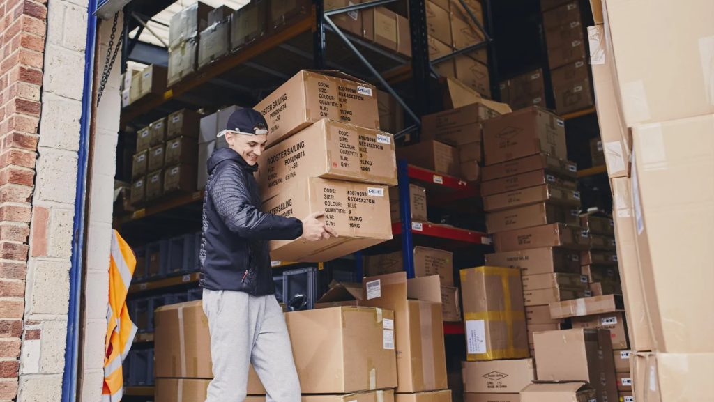 Warehouse worker with boxes