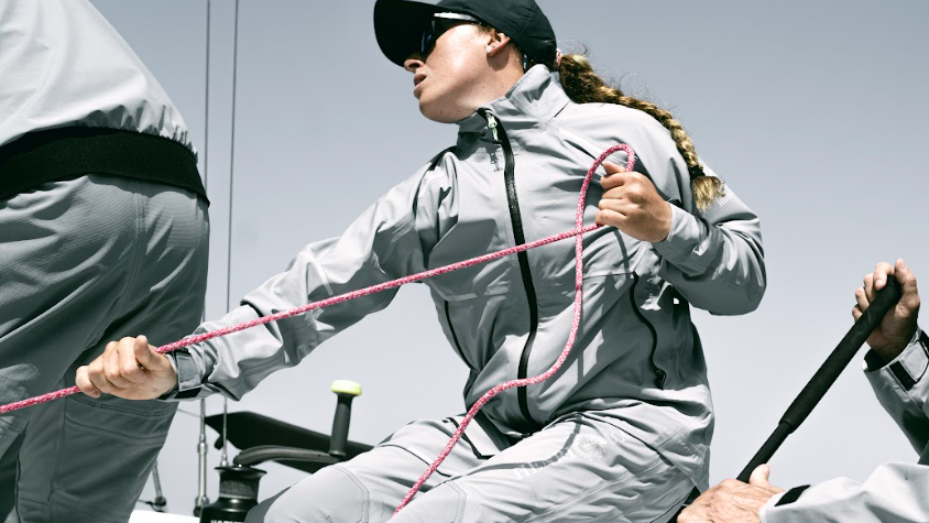 Sailor wears Henri-lloyd's new dynamic range onboard boat - in grey